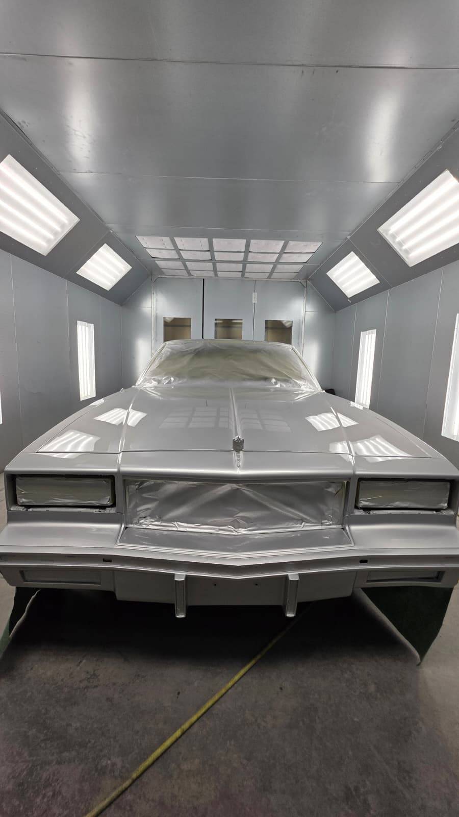 Classic car in CarTech's paint booth in Smyrna, TN — front view